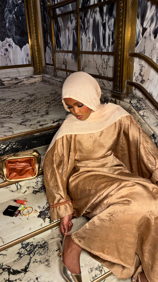 Champagne Marble Abaya – champagne satin abaya with marbled gold motif by Iqlimah Couture
